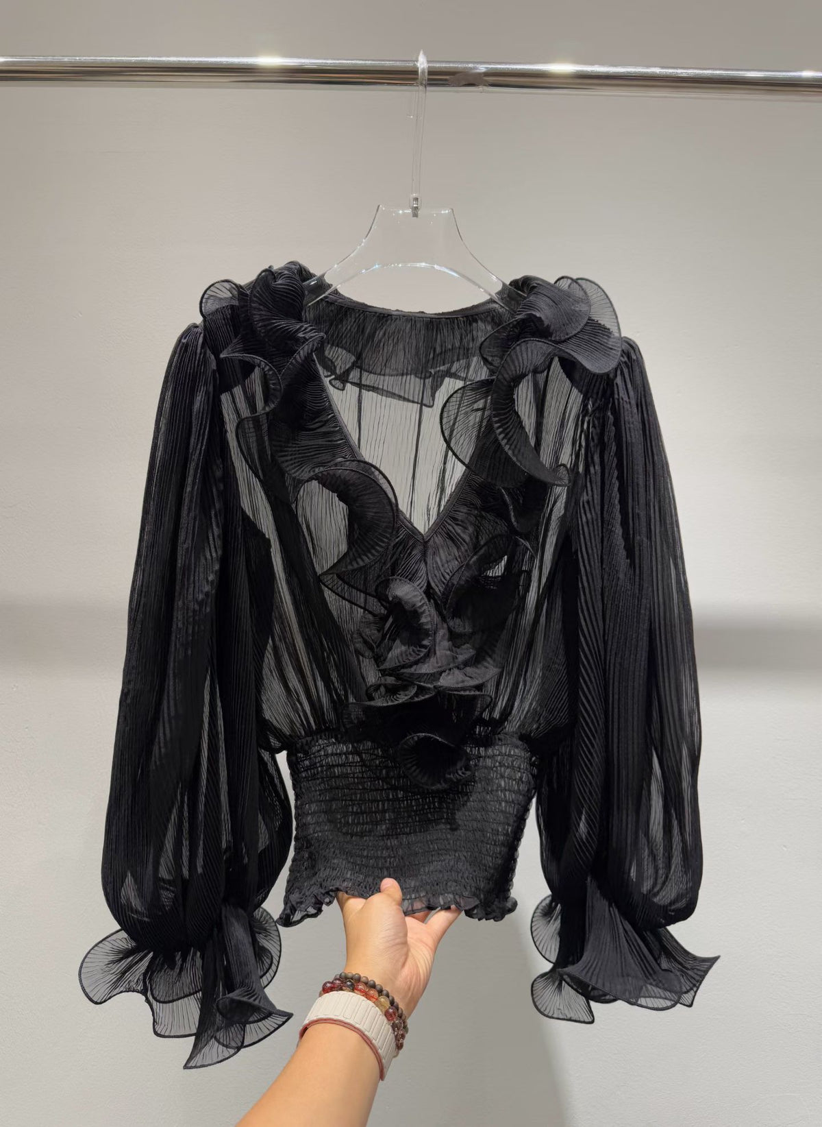 Pleated ruffle blouse in black