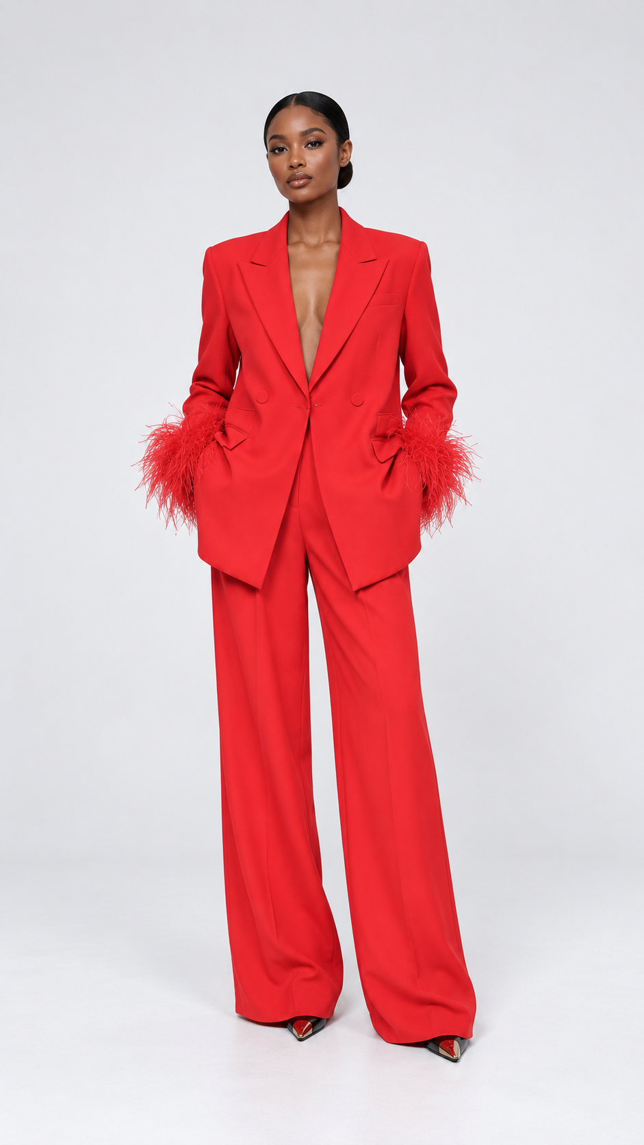 ElegantWom red feather-trim blazer and wide-leg trouser set, front full-length view showcasing the statement feather cuffs and tailored silhouette / ElegantWom