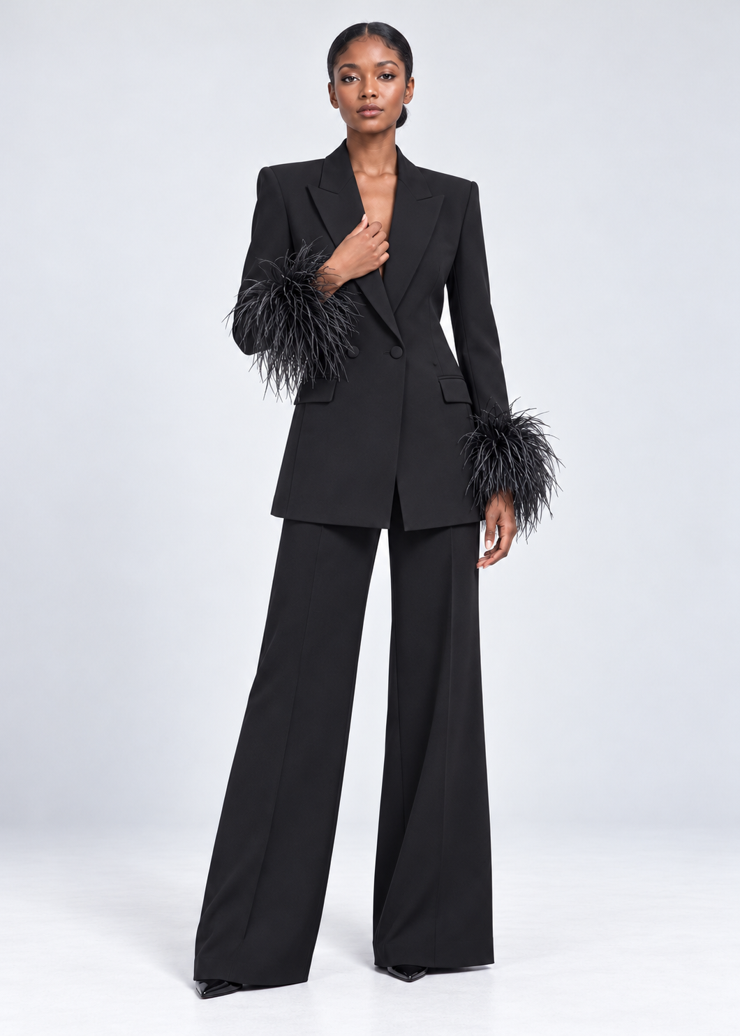 ElegantWom black feather-trim blazer and wide-leg trouser set, front full-length view showcasing the statement feather cuffs and tailored silhouette