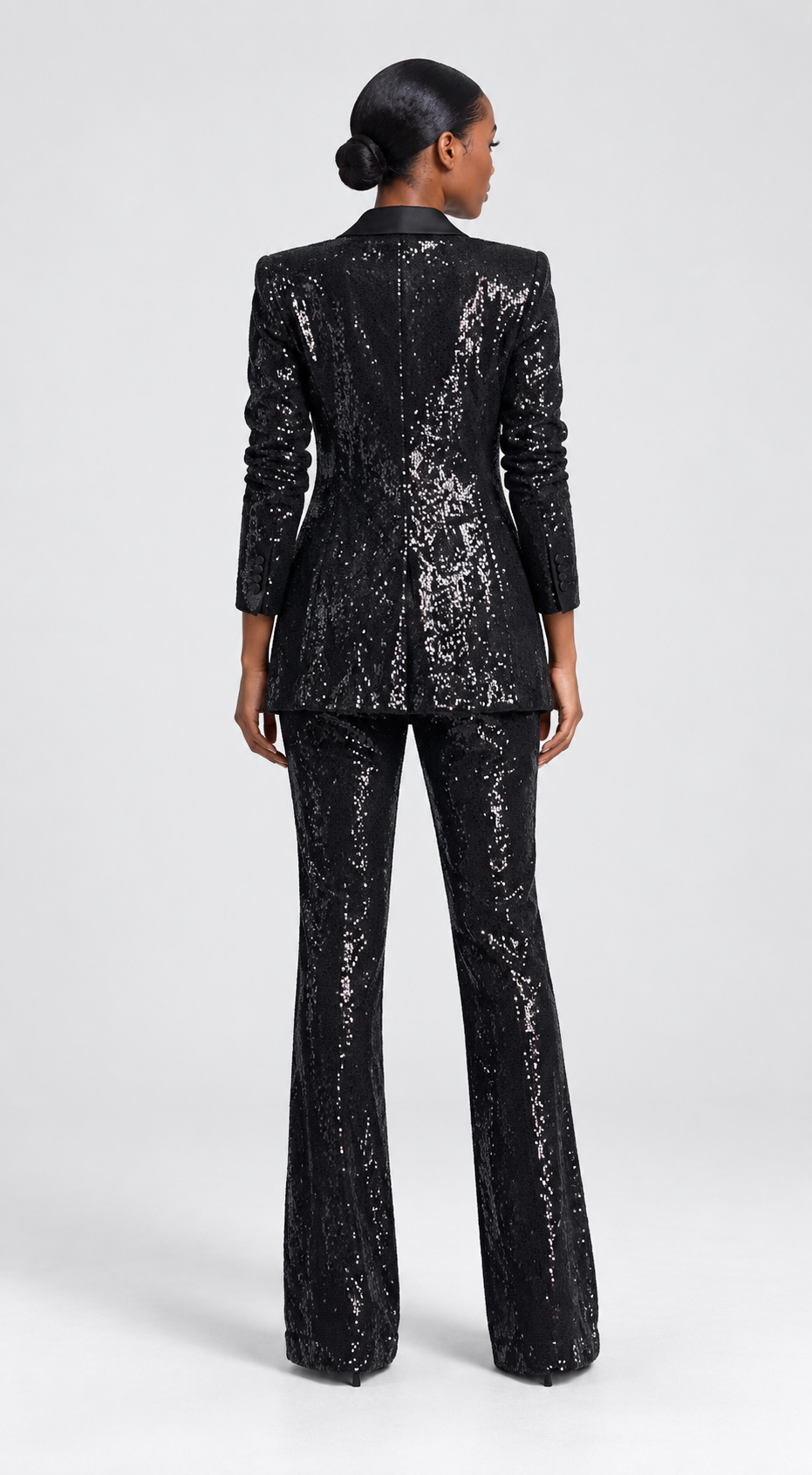ElegantWom black sequin tailored suit, back view showing the seamless sequin coverage and tailored fit