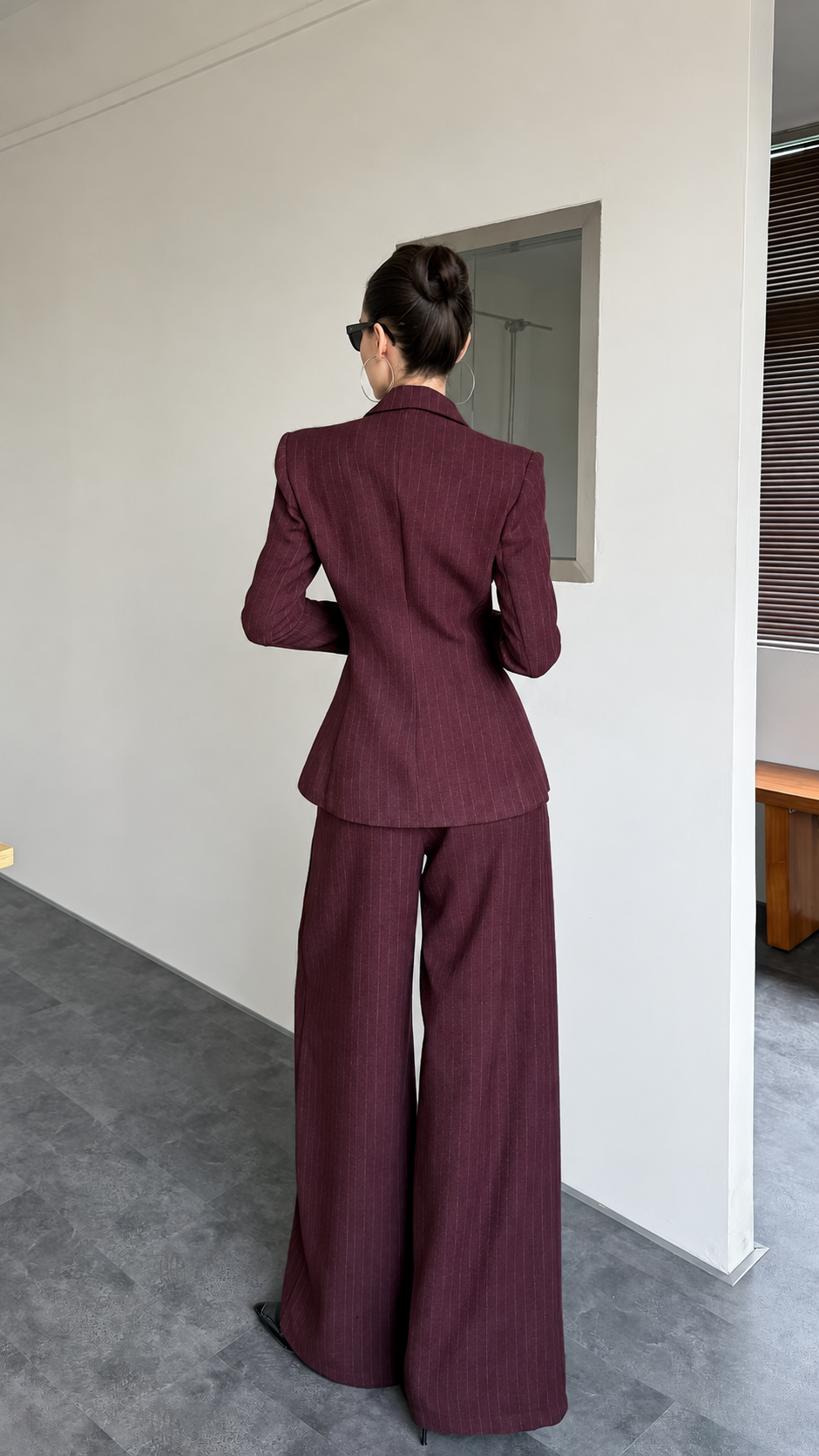 Burgundy pinstripe blazer and wide-leg trouser suit shown from the back