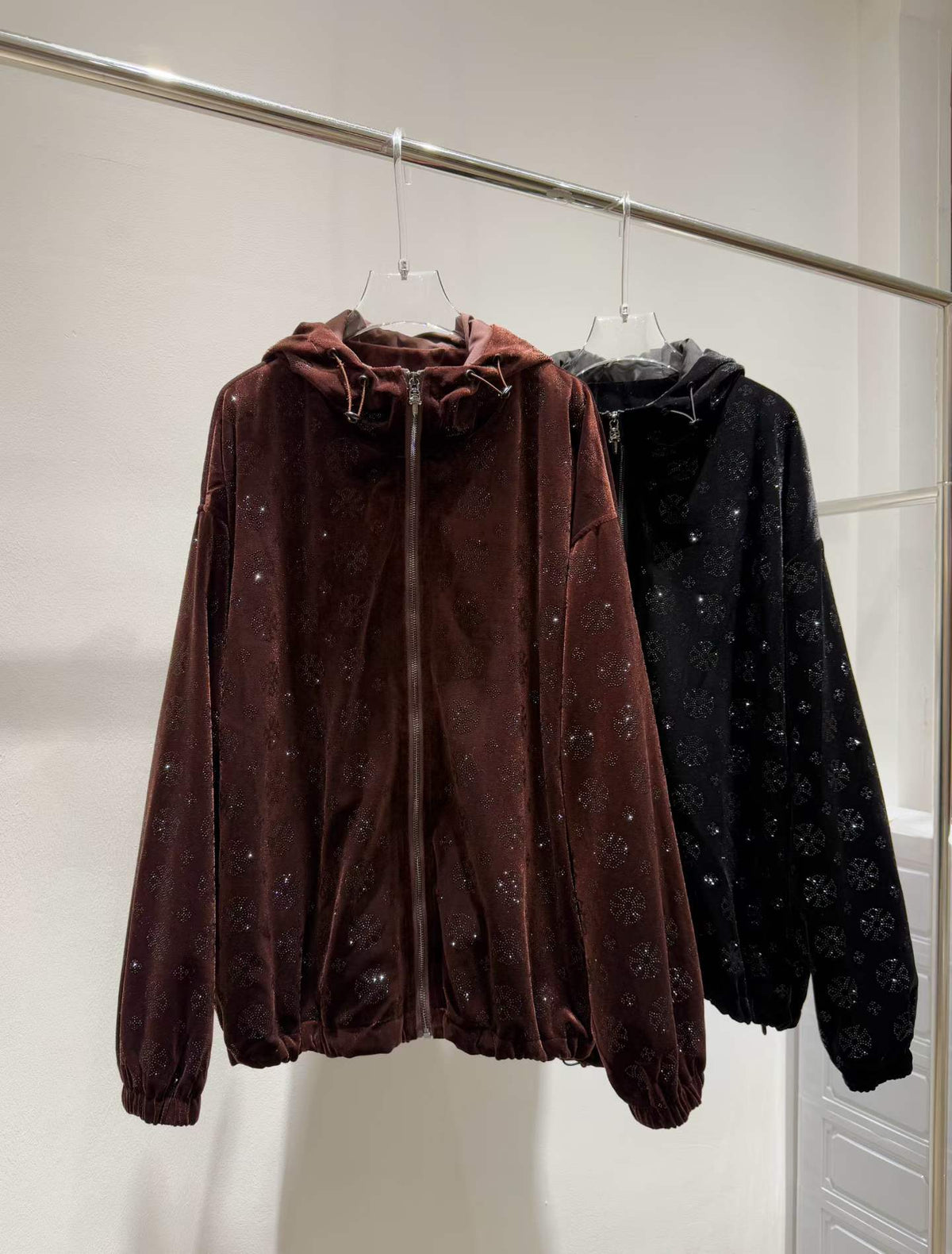 Brown and Black floral sparkle hooded zip-front jacket, both colours