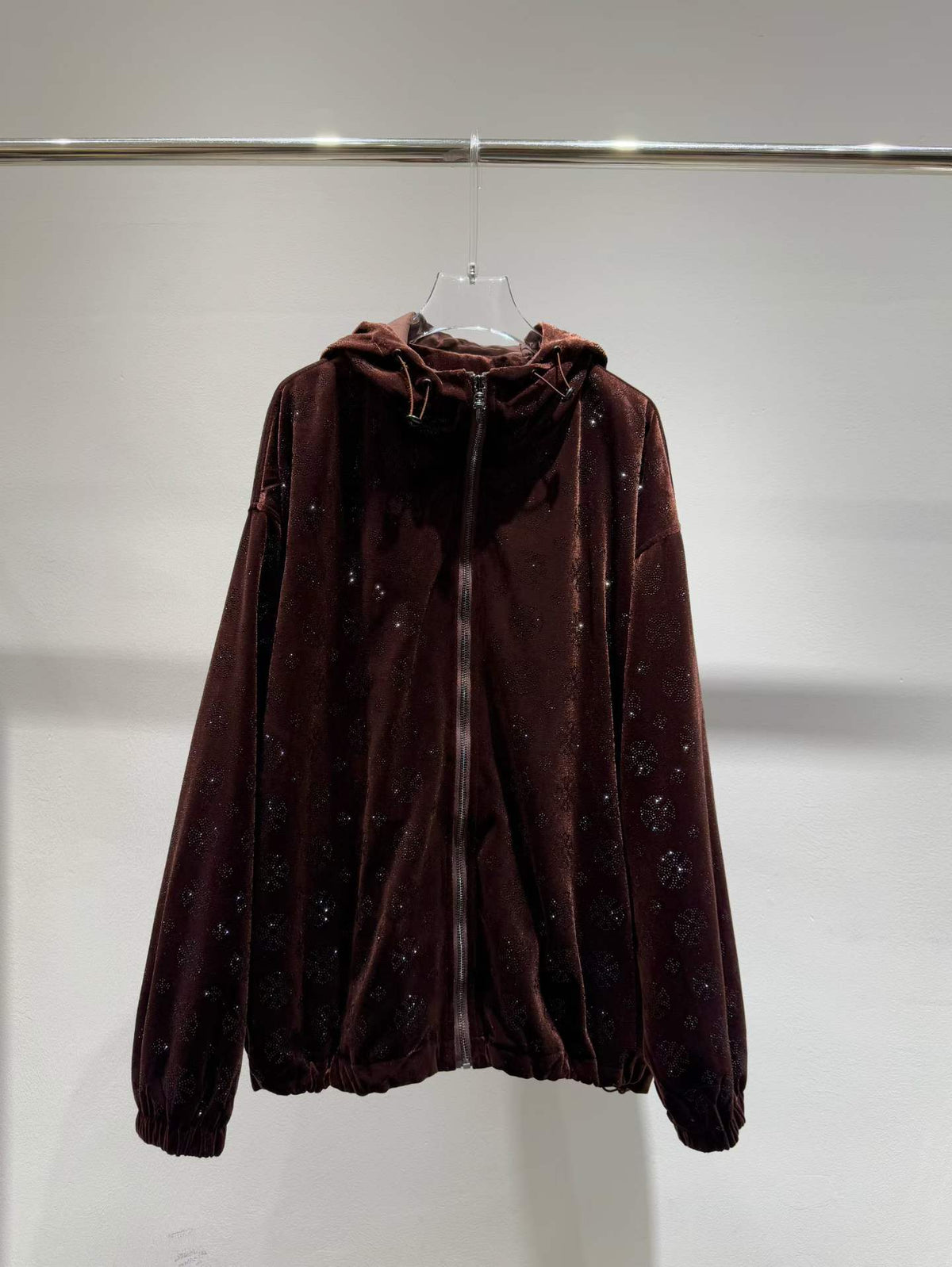Brown floral sparkle hooded zip-front jacket, front view