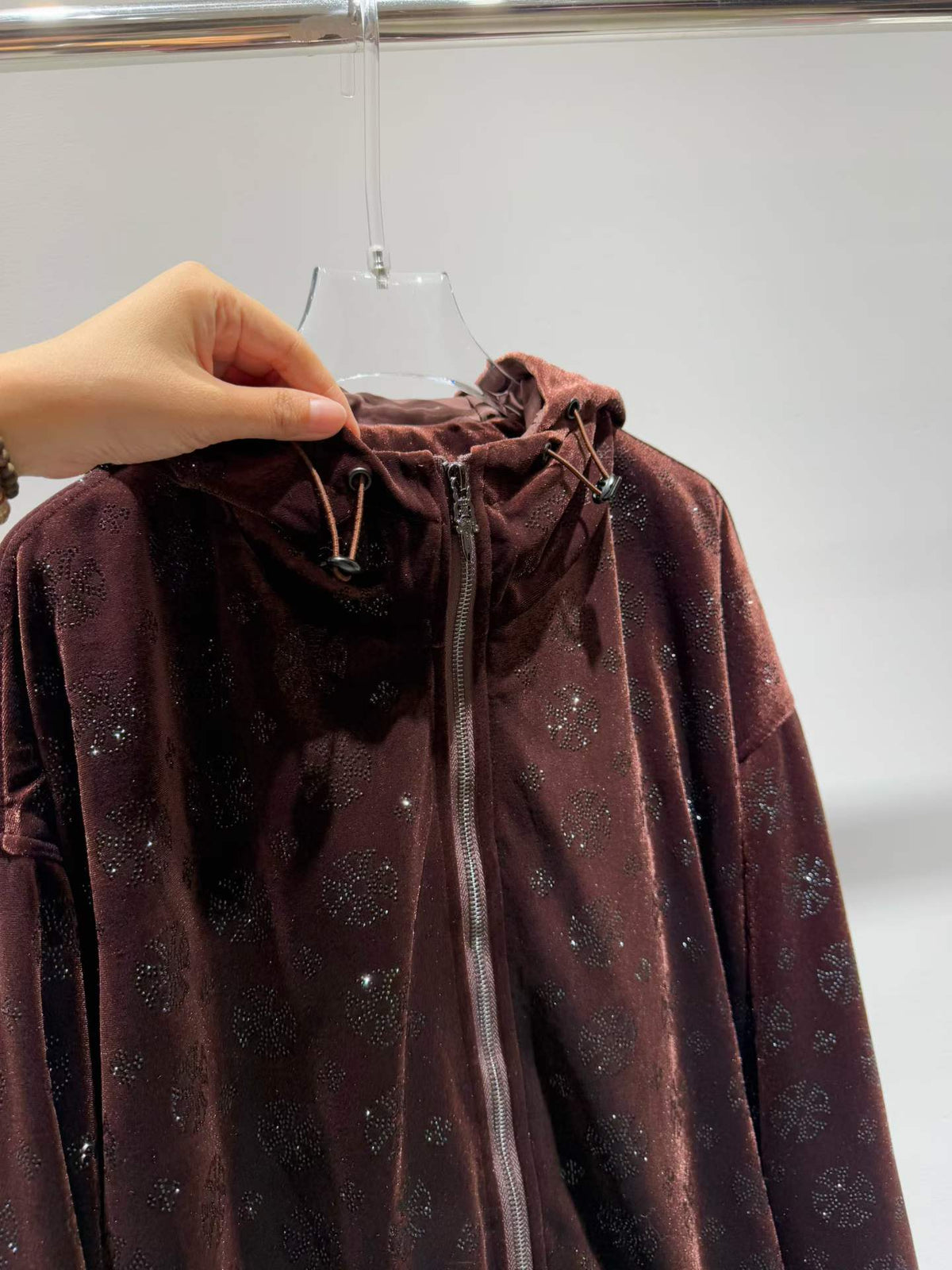 Brown floral sparkle hooded zip-front jacket, hood detail