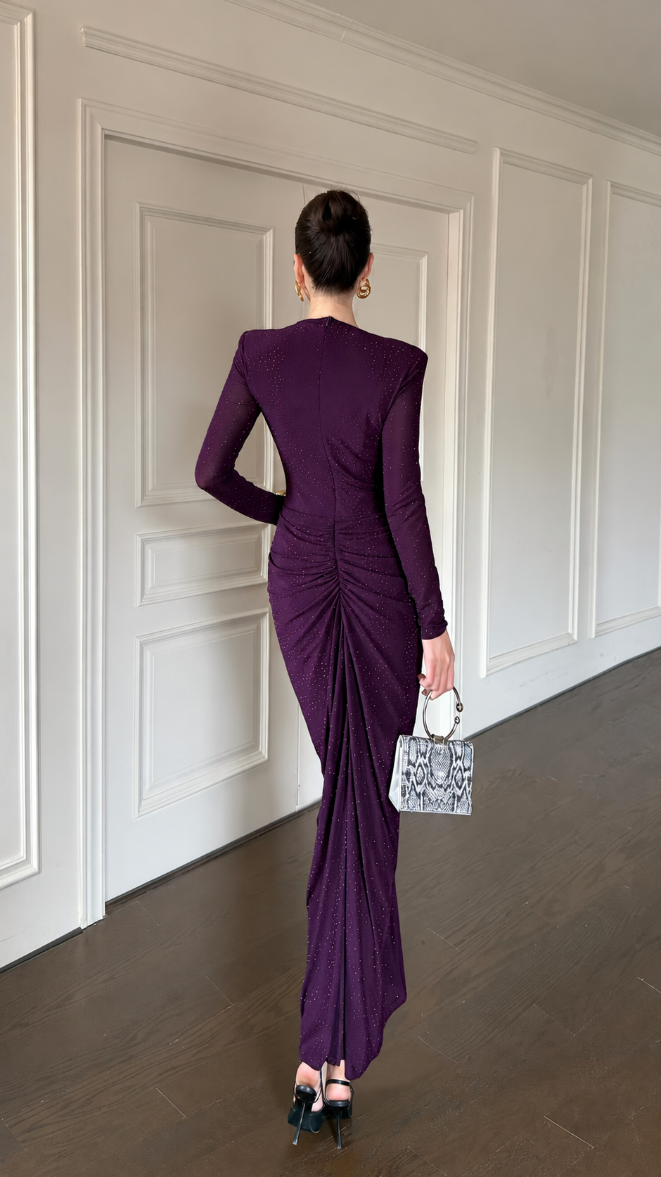 Back view of the plum long-sleeve maxi dress with gathered back ruching