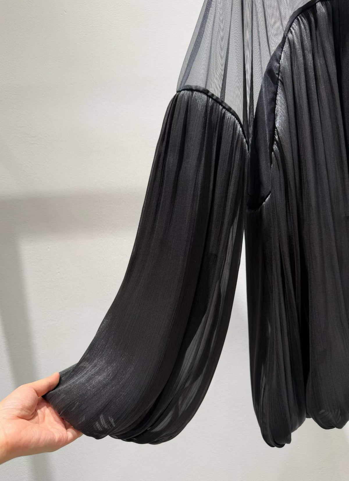 Black blouse pleated balloon sleeve detail