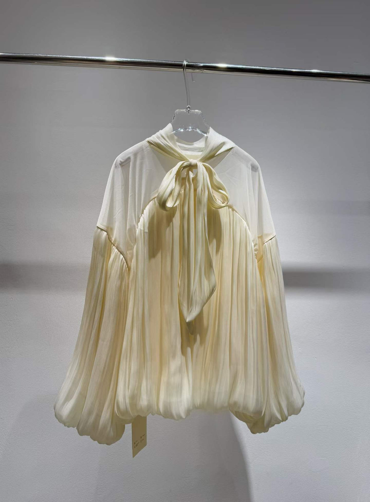 Ivory sheer-yoke tie-neck blouse with bow, full view