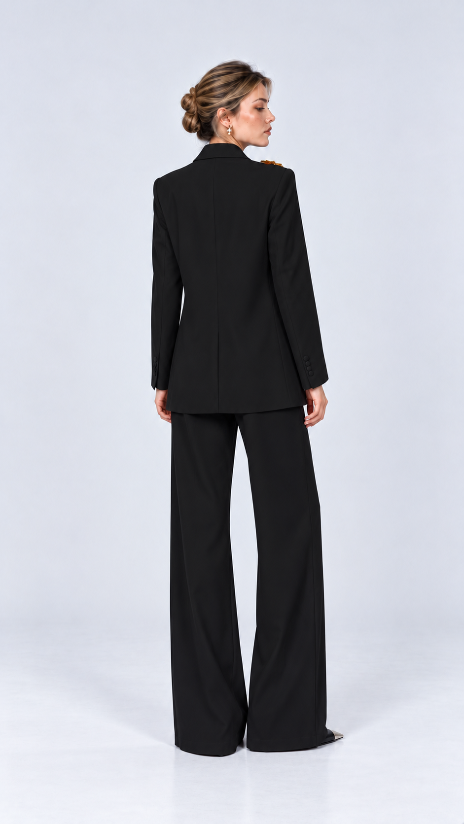 Black embellished pantsuit with relaxed longline blazer, back studio view