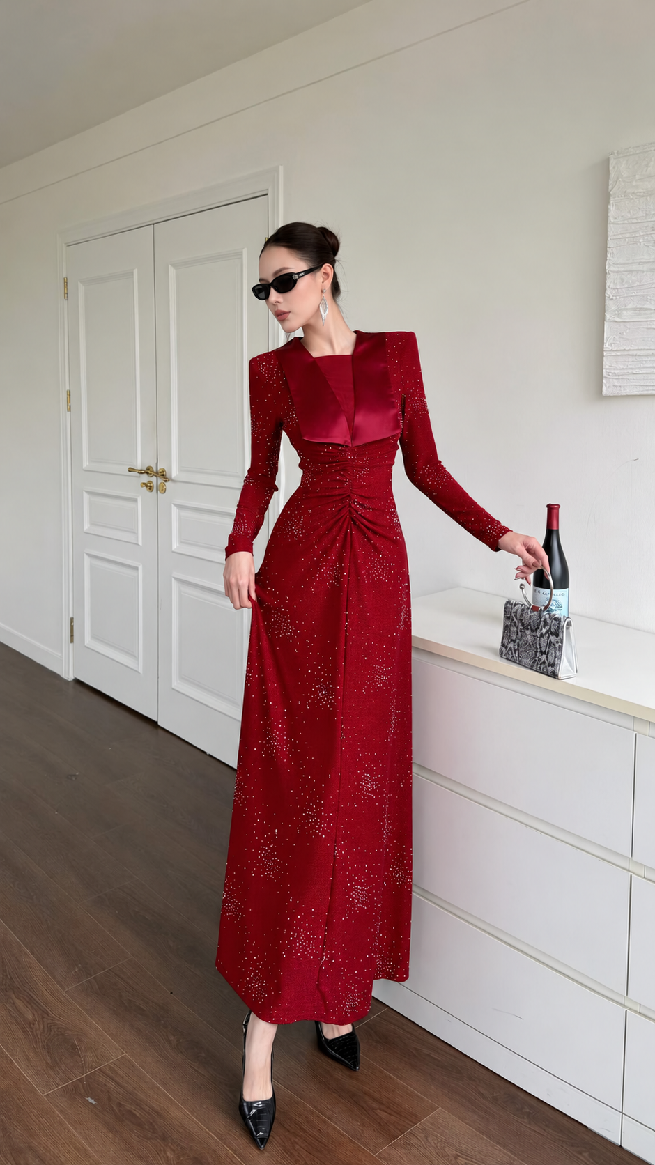 Burgundy embellished maxi dress with long sleeves, contrast sheen lapel-style panels and a floor-length skirt.