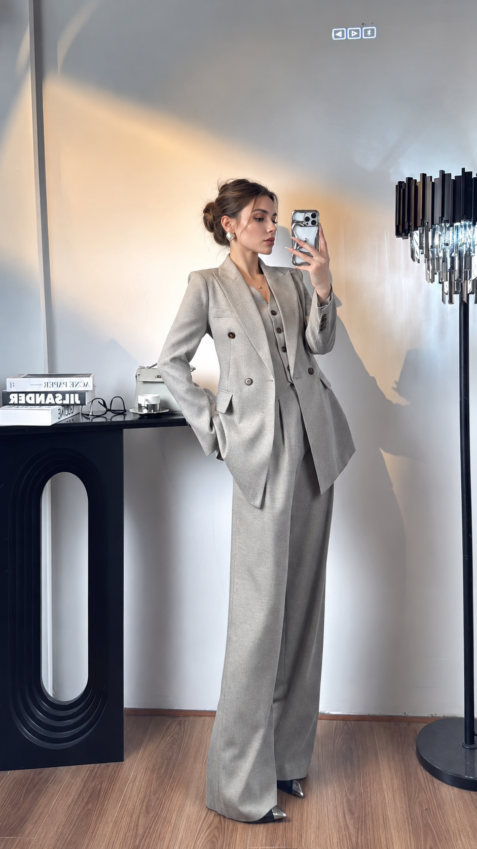 Women's light gray blazer, button-front vest and wide-leg trousers, angled front view