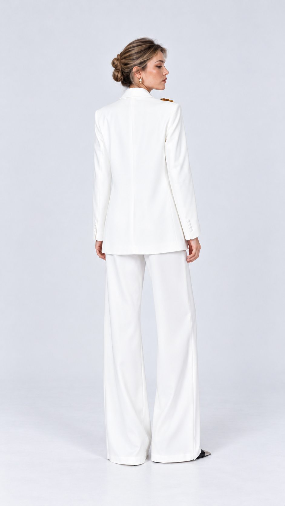 White embellished pantsuit with relaxed longline blazer, back studio view